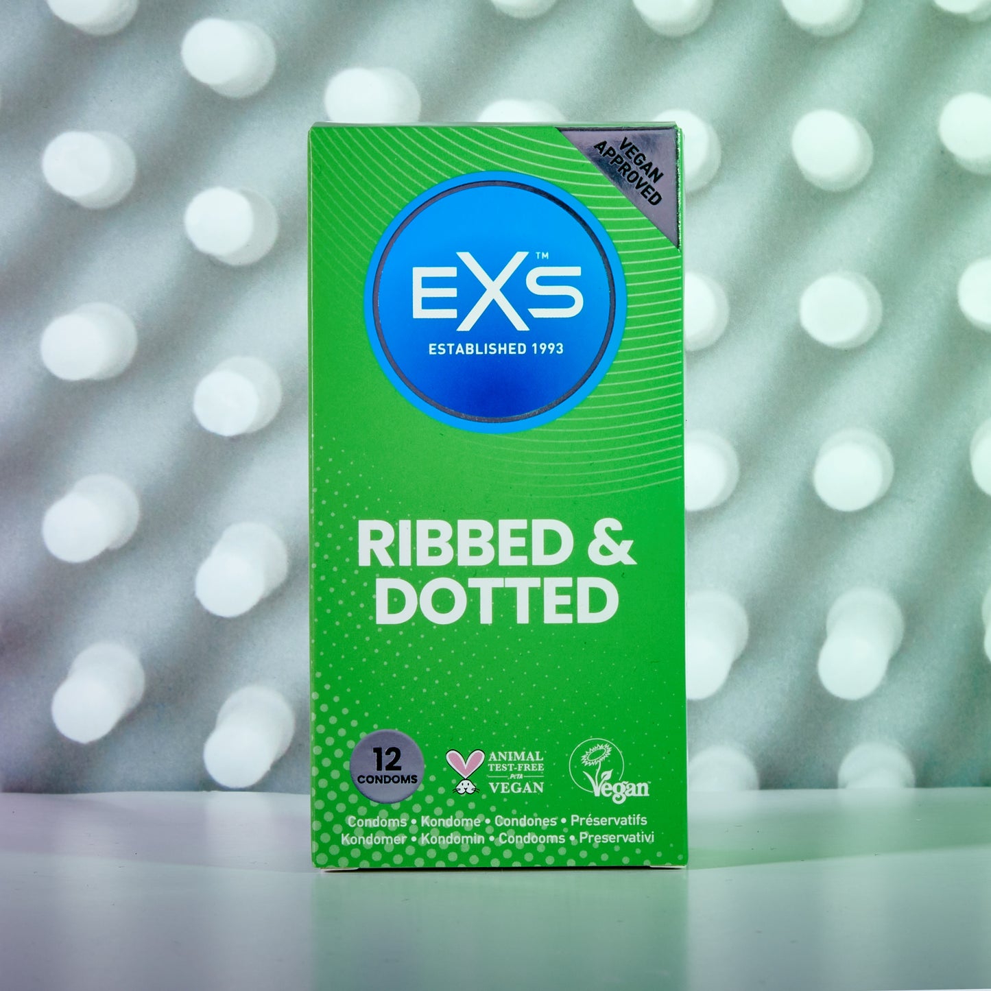 exs condoms ribbed and dotted 12 pack with background
